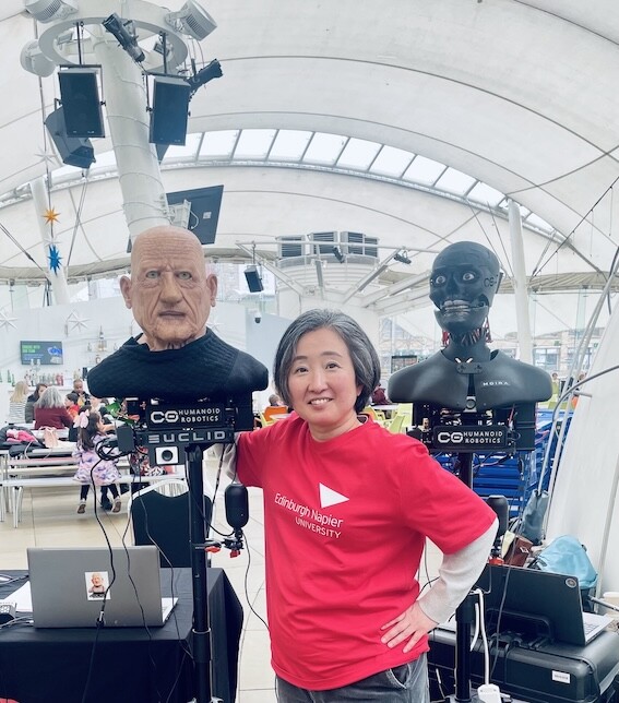 Mayuko hanging out with her robots.